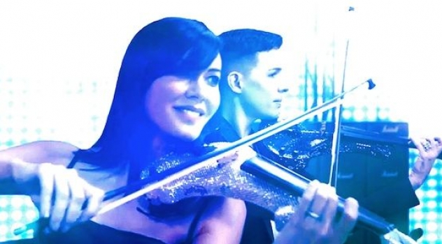 Electric Violinists Linzi Stoppard and Ben Lee Rock Queen